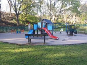 adventure playground at Shibden Park  -Halifax includes slides, House Den, and Wobbly Car