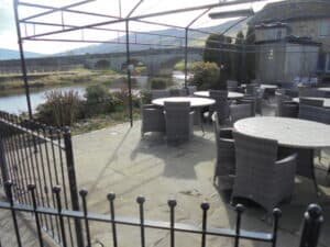 Outdoor seating by the River Wharfe Red Lion Pub, Restaurant and Hotel, Burnsall, Skipton BD23 6BU